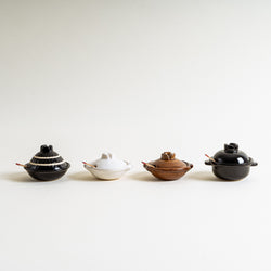 Four donabe shape condiment containers