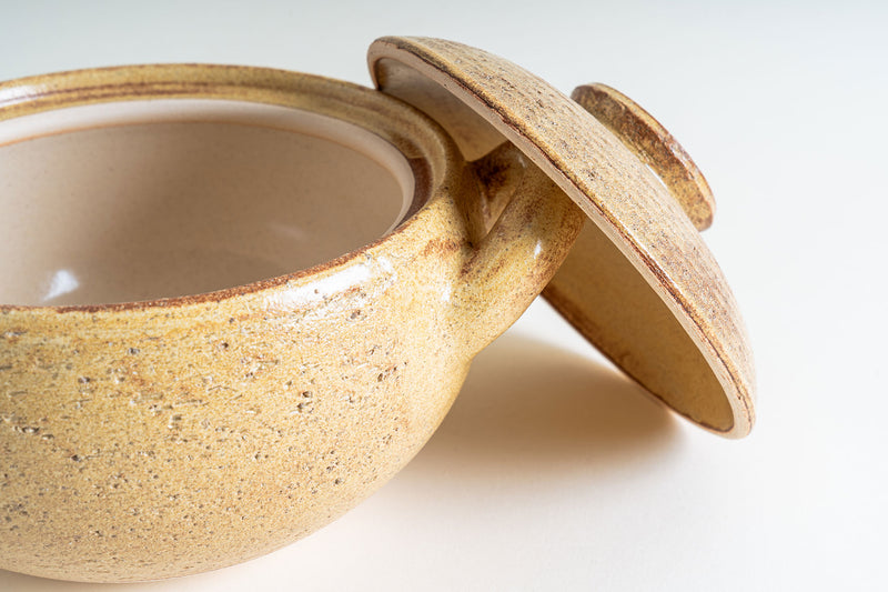 Close-up of the Nagatani-en Miso-Shiru Donabe, showcasing its interior, thick rim, and the underside of its matching lid