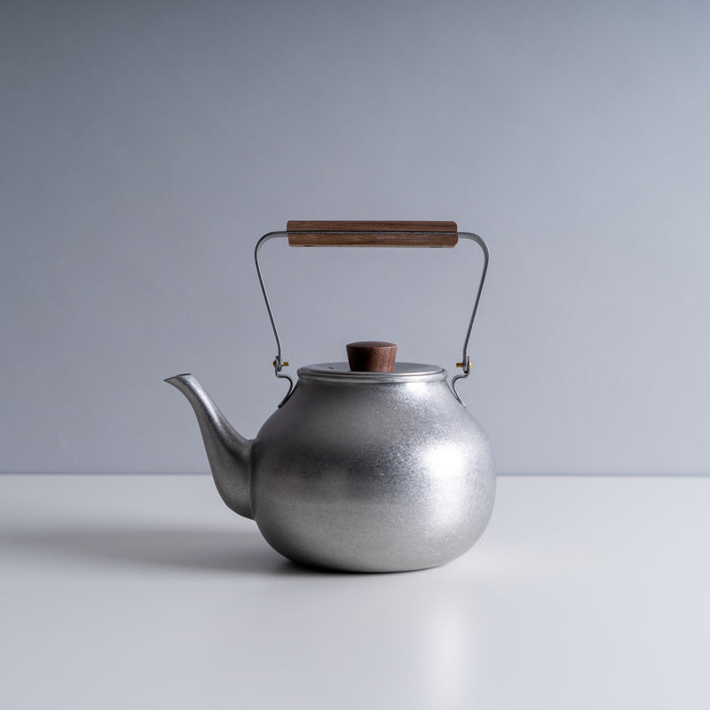 Teapot with Wooden Handle in Sliver