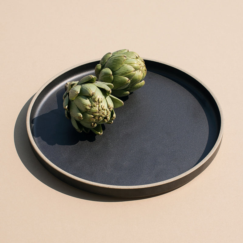 Two artichokes in a 10" Hasami Porcelain Plate in Black - Mogutable