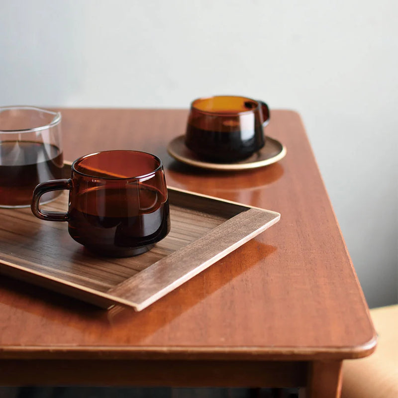 Coffee in Kinto Sepia Cup and Mug in a tray on wooden table